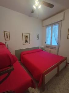 Postel nebo postele na pokoji v ubytování Guest House Attico Della Vittoria