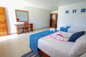 Postel nebo postele na pokoji v ubytování Villa Martins, Inhaca, Mozambique