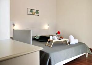 Postel nebo postele na pokoji v ubytování Nuovo Hotel Giardini