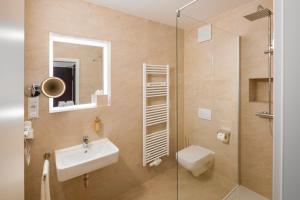 Ванная комната в MiDoma, Self Check-In Hotel, Hannover Messe