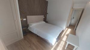 Postel nebo postele na pokoji v ubytování Hostal Rural Sositana