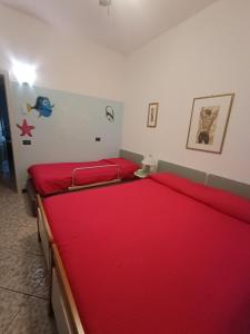 Postel nebo postele na pokoji v ubytování Guest House Attico Della Vittoria