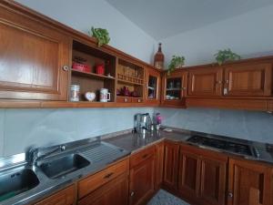 Kuchyň nebo kuchyňský kout v ubytování Guest House Attico Della Vittoria