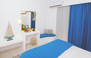 Postel nebo postele na pokoji v ubytování Mojito Beach Rooms