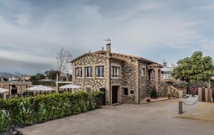 Fotografia z galérie ubytovania Ca la Joia Casa con piscina privada en la Vall d'en Bas v destinácii Les Preses
