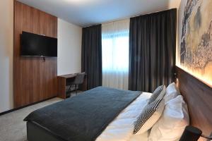 Televisyen dan/atau pusat hiburan di Tvrdjava Rooms - Novi Sad