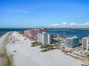 an aerial view of a beach with buildings and the ocean at Beach Villas # 304 - BOGO24 condo in Fort Myers Beach