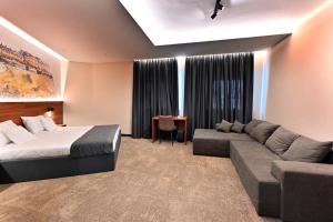 Ruang duduk di Tvrdjava Rooms - Novi Sad