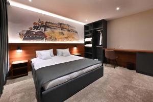 Katil atau katil-katil dalam bilik di Tvrdjava Rooms - Novi Sad