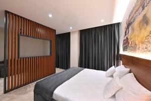 Katil atau katil-katil dalam bilik di Tvrdjava Rooms - Novi Sad
