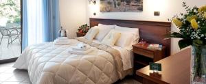 A bed or beds in a room at Relais Casina Copini