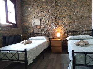 Postel nebo postele na pokoji v ubytování Casa Fonset