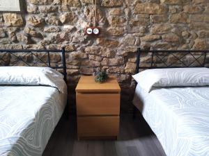 Postel nebo postele na pokoji v ubytování Casa Fonset