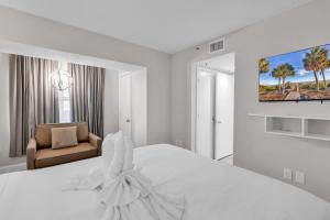 Voodi või voodid majutusasutuse 2BR Condo with Ocean View toas