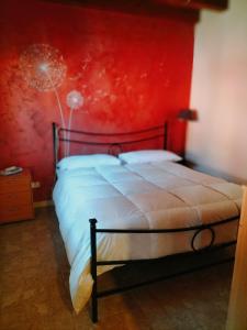 Postel nebo postele na pokoji v ubytování Agriturismo Nonna Luisa