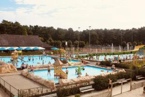 a group of people in a pool at a water park at Goolderheide 369 in Bocholt