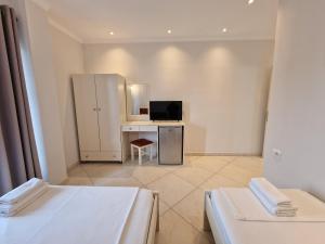 TV a/nebo společenská místnost v ubytování Hotel Fabio