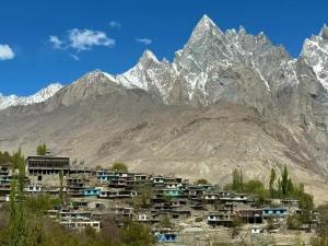 a town in front of a mountain with a city at North Palace Khaplu in Khaplu