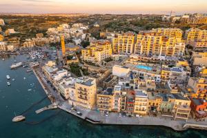 Nespecifikovaný výhled na destinaci Marsaskala nebo výhled na město při pohledu z apartmánu