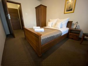Łóżko lub łóżka w pokoju w obiekcie Hotel Constancja