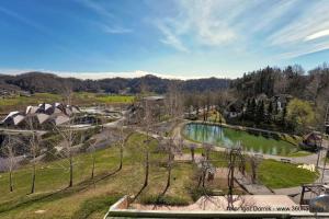 an aerial view of a park with a pond at Terme Olimia - Apartment 407 in Podčetrtek