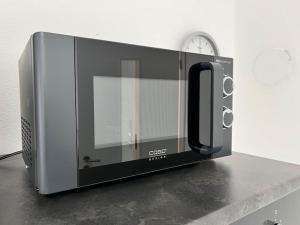 Kuchyň nebo kuchyňský kout v ubytování Neue Wohnung für 4 Küche Terrasse