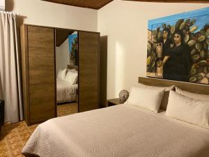 Postel nebo postele na pokoji v ubytování Mary Home Sicily