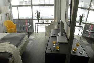 Postel nebo postele na pokoji v ubytování Arthotel Heidelberg