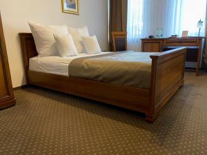Łóżko lub łóżka w pokoju w obiekcie Hotel Constancja