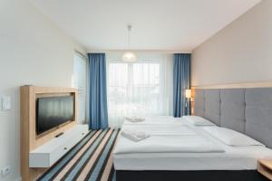 Posteľ alebo postele v izbe v ubytovaní Bel Mare 402D + 19 fotografií