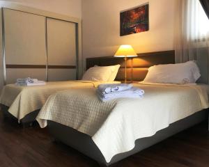 Postel nebo postele na pokoji v ubytování Chateau Linza Resort