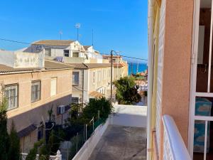 a view from the balcony of a building at Beach apartment 6 persons La Mata in La Mata