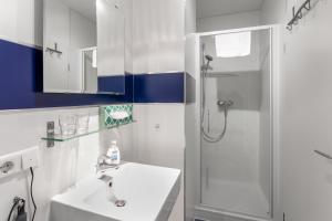 Koupelna v ubytování Pensionsieben Das andere Hotel + 37 fotografií