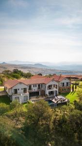 an aerial view of a house with a yard at Mount High Luxury Country Estate in Lydenburg