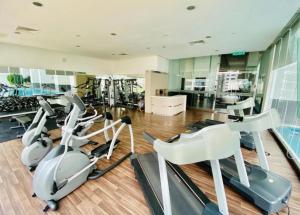 a gym with treadmills and elliptical machines at 1ceylon pharoh studio in Kuala Lumpur