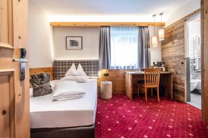 Postel nebo postele na pokoji v ubytování Hotel Schmung