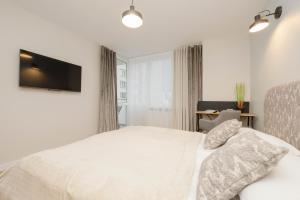 Posteľ alebo postele v izbe v ubytovaní Comfortable Apartment Warsaw Wola & Balcony by Noclegi Renters