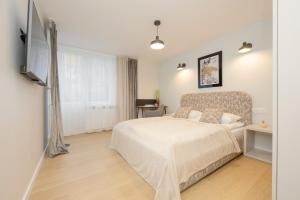 Posteľ alebo postele v izbe v ubytovaní Comfortable Apartment Warsaw Wola & Balcony by Noclegi Renters