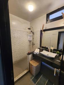 a bathroom with a sink and a mirror at Aprt 4 Family in Marrakech