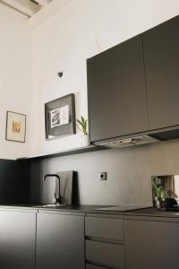 A kitchen or kitchenette at Casa Miguel - Apartamento 6