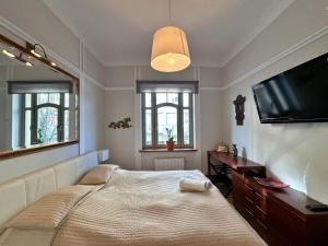 Łóżko lub łóżka w pokoju w obiekcie Azja, Sopot Monte Cassino, Balkon, Parking