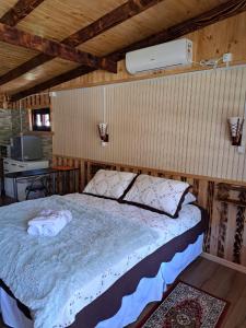Ένα ή περισσότερα κρεβάτια σε δωμάτιο στο Hostal Robinson