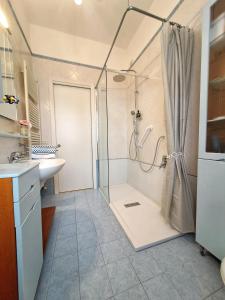 a bathroom with a shower and a sink at Casa Mutti in Asolo +29 photos