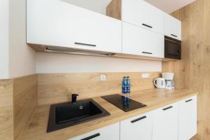 Kuchyňa alebo kuchynka v ubytovaní Your Holidays Bel Mare 406 D