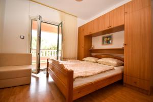 Postel nebo postele na pokoji v ubytování Rooms Anđela