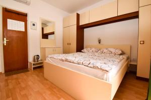 Postel nebo postele na pokoji v ubytování Rooms Anđela