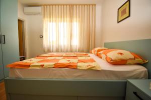Postel nebo postele na pokoji v ubytování Rooms Anđela