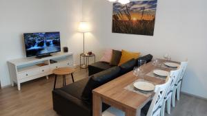 TV in/ali zabaviščno središče v nastanitvi Apartmán Trilobit