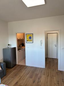 Kuchyň nebo kuchyňský kout v ubytování Venice Rooms