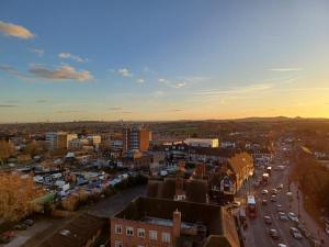 an aerial view of a city with cars on a street at Luxury Apartment With Stunning Views on 10th floor in Edgware